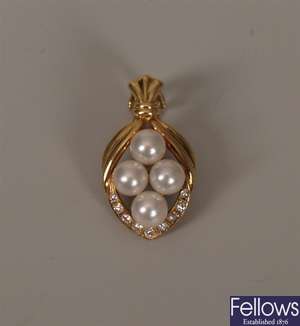 18ct gold pearl enhancer of marquise shape with a