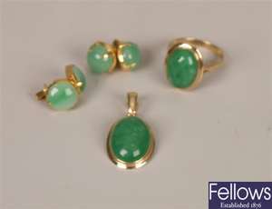 Four jade set items, to include a 14ct gold oval