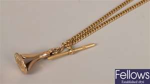 18ct gold curb link albert chain with t-bar and