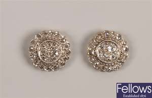 Pair of diamond cluster stud earrings with four