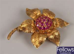 18ct gold ruby set flower design brooch, with a