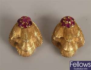 18ct gold ruby set shell shape earrings, with