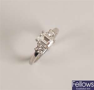 18ct white gold three stone diamond ring, with a