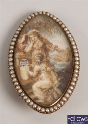 Miniature portrait memorial brooch depicting two