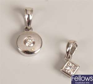 Two 18k white gold diamond pendants to include an