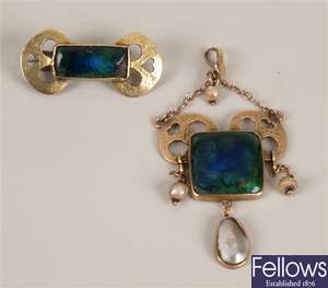 Arts & Crafts gold pendant with central enamel