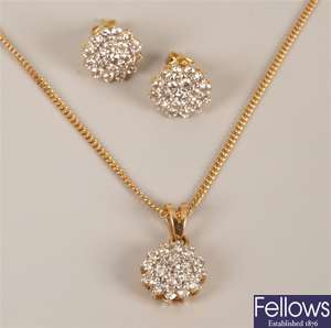 18ct gold diamond pendant and earring suite in