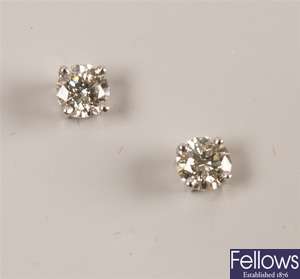 Pair of 18k white gold single stone diamond stud
