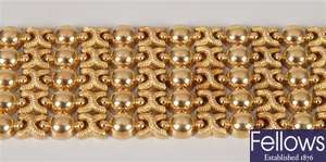 18ct gold fancy link bracelet with ball and cross