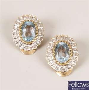 A pair of 9ct gold blue topaz and diamond cluster