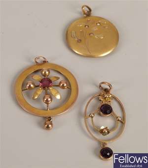 Three pendants, to include a hollow circular