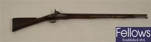 Antique flintlock rifle with steel barrel and