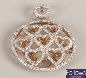 18ct bi-colour gold diamond set pendant, in a