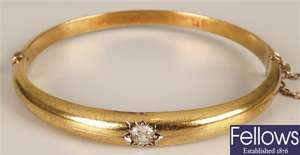 15ct gold single stone diamond set bangle with an