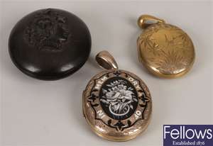 Three lockets, to include an oval mourning locket
