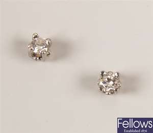 Pair of 18ct gold diamond claw set stud earrings