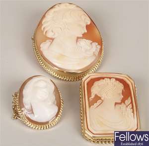 Three 9ct gold mounted brooches to include a
