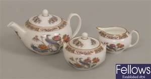 A miniature Wedgwood teapot with colourful floral