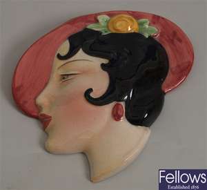 A Cope and Co. pottery wall mask modelled as the