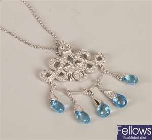 18ct white gold diamond and blue topaz pendant,