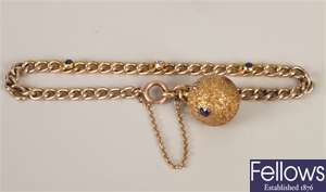 Gold curb link bracelet set a diamond and two