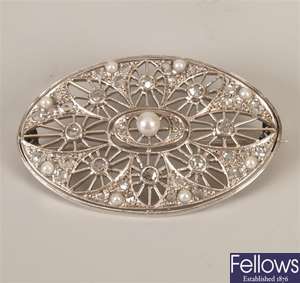 White gold oval plaque brooch with central pearl