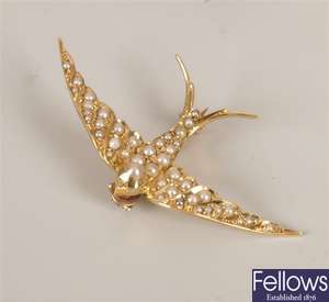 15ct gold swallow bird brooch completely set with