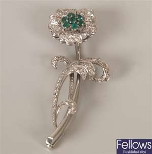 White gold mounted diamond and emerald floral