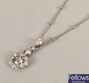 18ct white gold diamond cluster pendant with a