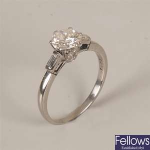 Platinum single stone diamond ring with a round