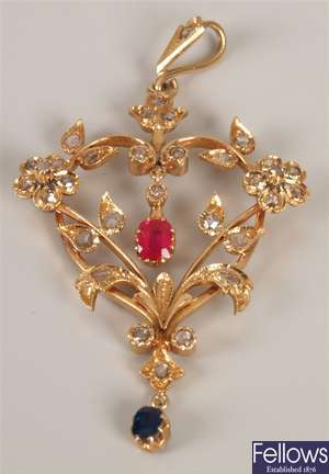 Continental diamond, ruby and sapphire set