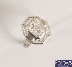 Diamond cluster ring with a central raised
