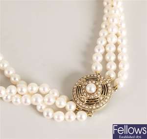 Three row uniform cultured pearl necklet on a 9ct