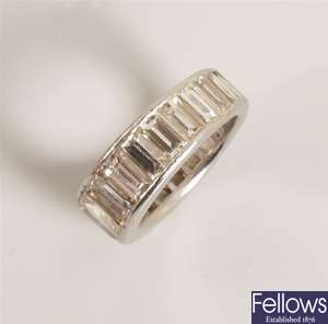 Diamond set tapered full eternity ring with