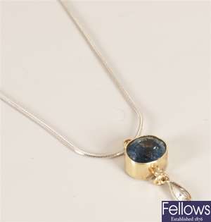 Sapphire and diamond set pendant, with an oval