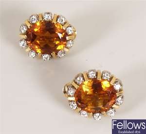 Pair of citrine and diamond cluster earrings with