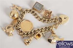 9ct yellow gold curb link bracelet and padlock