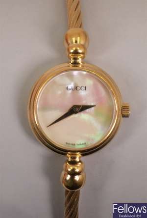 GUCCI - a ladies gold plated watch, model