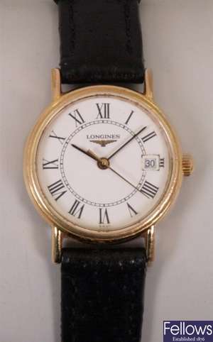 LONGINES - A ladies gold plated battery operated