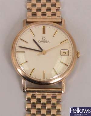 OMEGA - a gentleman's 9ct with silvered dial,