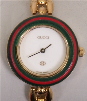 GUCCI - a ladies 1100-L series gold plated wrist