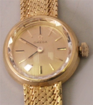 OMEGA - a ladies 18ct gold, manual wind wrist