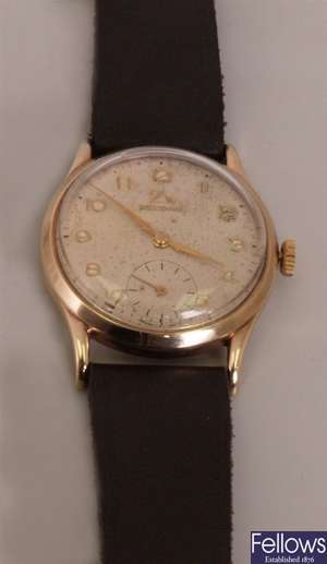 RECORD- a gentleman's 1950's 9ct manual wind with