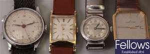 Four assorted ladies and gentleman's watches to