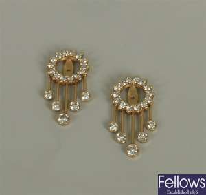 A pair of 14ct gold diamond set earring