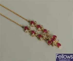18ct gold ruby and diamond necklet with oval