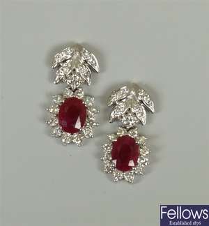A pair of 18ct white gold ruby and diamond floral