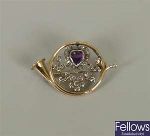 Amethyst and diamond French horn design brooch