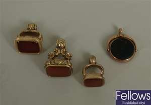 Four fobs, to include an early 20th century 9ct