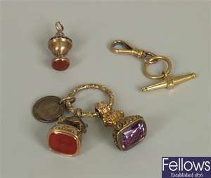 Seven items, to include an ornate fob with bee